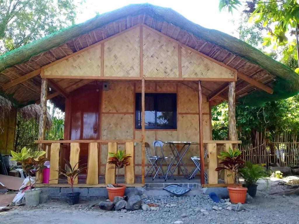 Traditional Filipino Transient House And Huts Near 100 Islands Wharf Alaminos Buitenkant foto